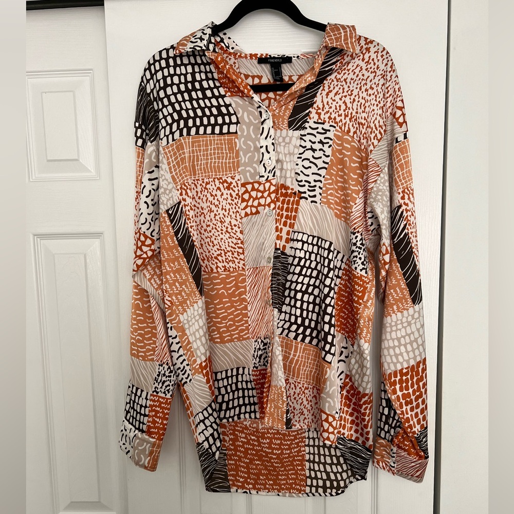 Orange patterned blouse